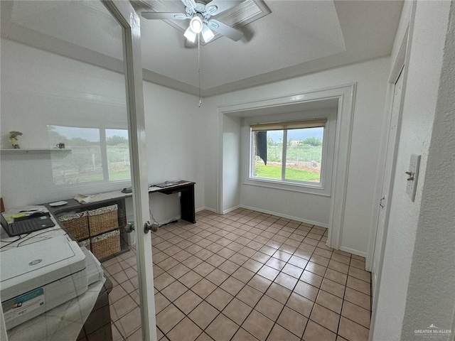 interior space featuring ceiling fan and light tile patterned flooring