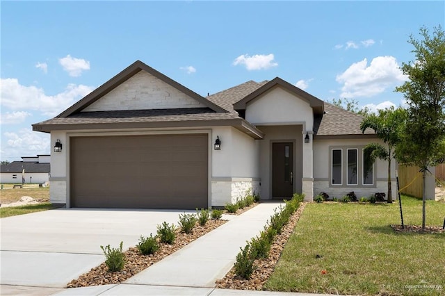 4909 Columbia Ave, Mcallen, TX 78504 - ranch-style house with roof with shingles, an attached garage, stucco siding, driveway, and a front yard