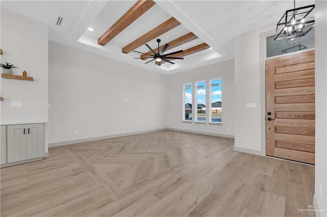 entrance foyer featuring ceiling fan, parquet floors, beamed ceiling, and baseboards