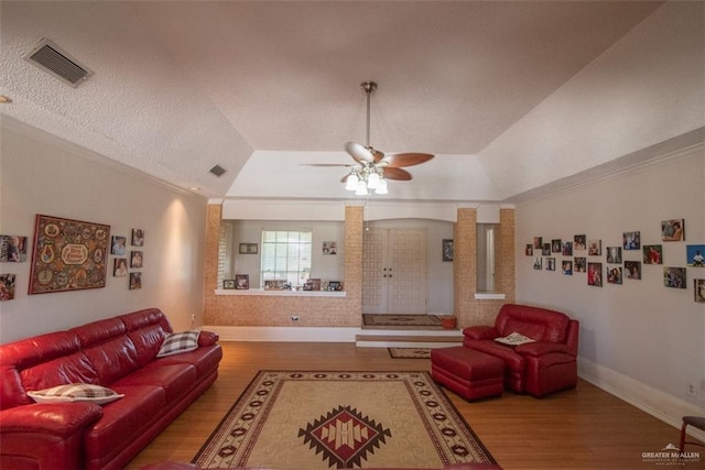 2517 E Mile 4th Rd, Mission, TX 78573 - living room with wood finished floors, baseboards, a ceiling fan, and crown molding