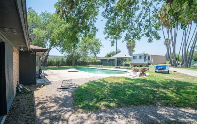 2517 E Mile 4th Rd, Mission, TX 78573 - view of swimming pool with a patio and a yard