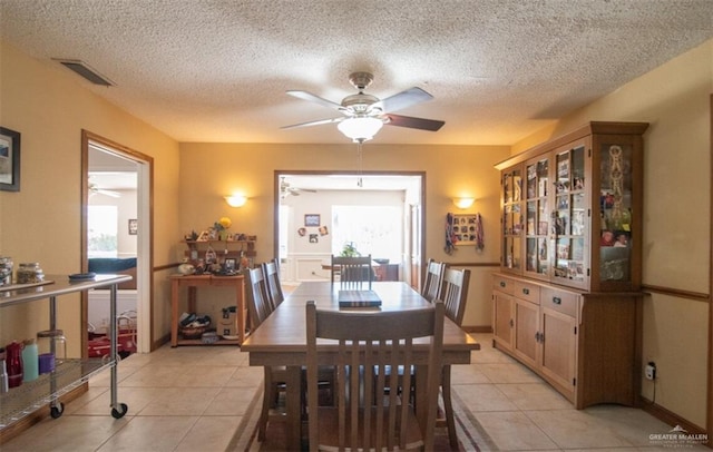 2517 E Mile 4th Rd, Mission, TX 78573 - dining area with a ceiling fan, light tile patterned floors, and a textured ceiling