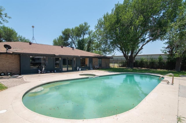 2517 E Mile 4th Rd, Mission, TX 78573 - view of swimming pool featuring a patio and a pool with connected hot tub