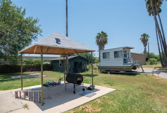 2517 E Mile 4th Rd, Mission, TX 78573 - view of grassy yard featuring an outbuilding