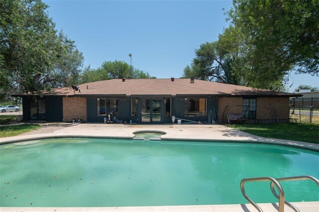 2517 E Mile 4th Rd, Mission, TX 78573 - view of pool with a patio area and a pool with connected hot tub