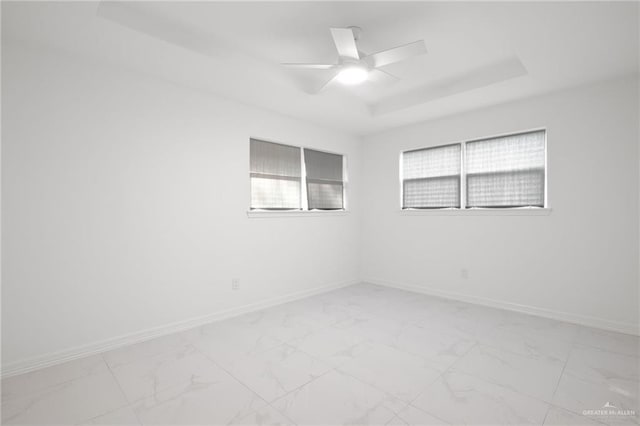 unfurnished room featuring ceiling fan