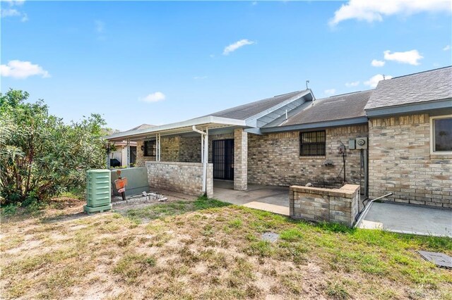 1923 Stadler Dr, Mission, TX 78572 - back of property with a patio