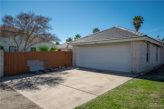 garage featuring fence