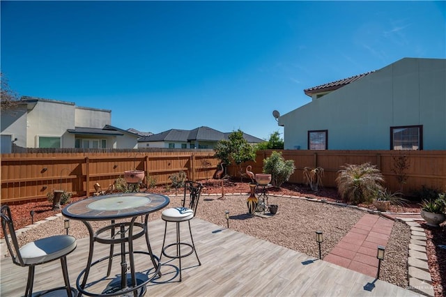 view of patio / terrace with outdoor dining area and a fenced backyard