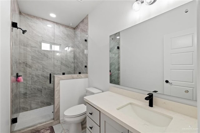 full bathroom with toilet, recessed lighting, vanity, marble finish floor, and a shower stall