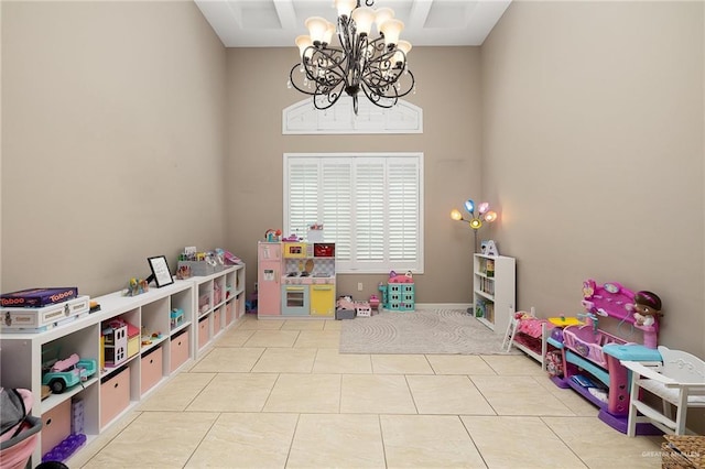 13410 N 36th Ln, Edinburg, TX 78541 - playroom featuring a chandelier, tile patterned floors, and a towering ceiling