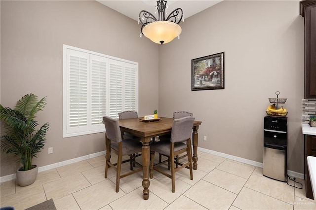 13410 N 36th Ln, Edinburg, TX 78541 - dining space with baseboards and light tile patterned floors