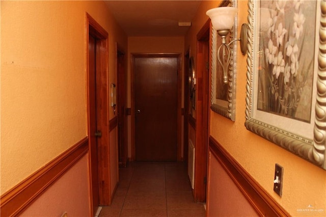 corridor with tile patterned floors