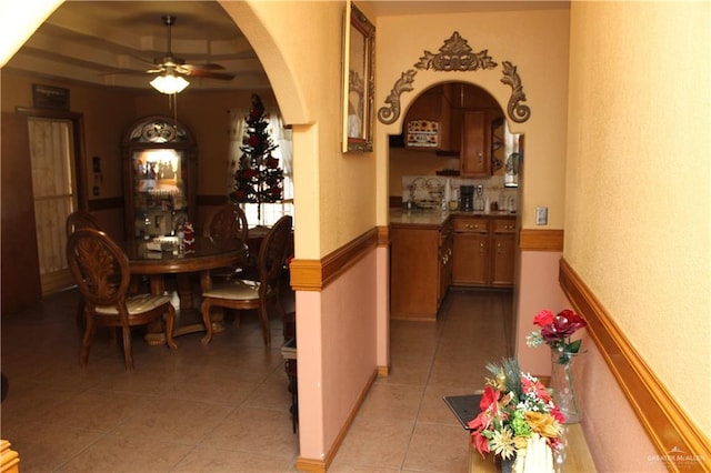 hall with light tile patterned flooring