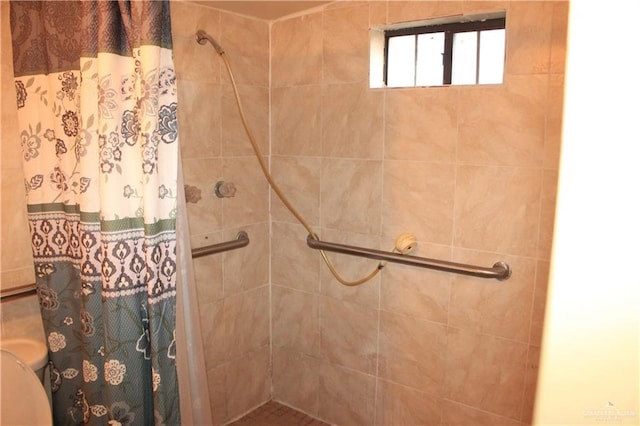 bathroom featuring walk in shower