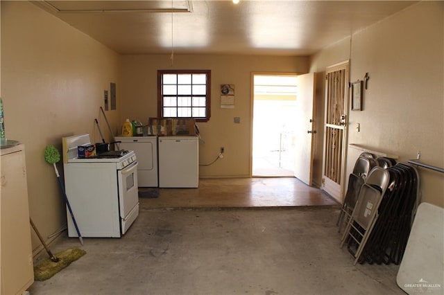 washroom featuring washing machine and dryer and electric panel