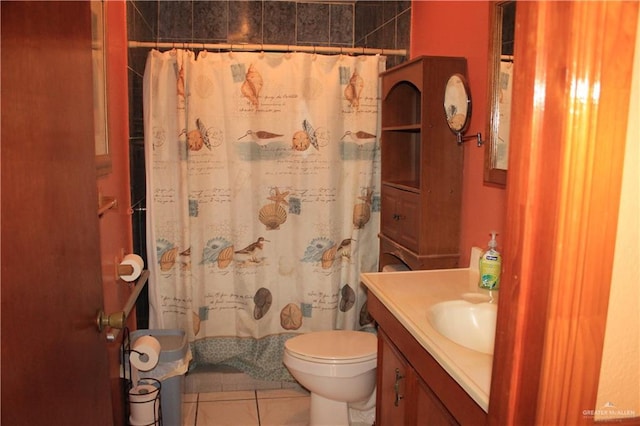 bathroom with tile patterned floors, vanity, toilet, and a shower with curtain