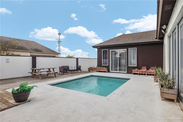 view of pool featuring a patio area and an outdoor hangout area