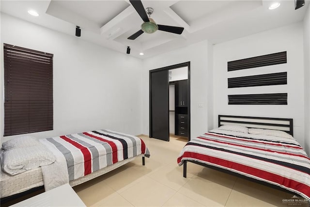 bedroom featuring ceiling fan and light tile patterned flooring