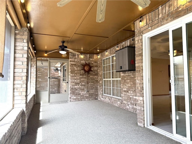 view of patio featuring a ceiling fan