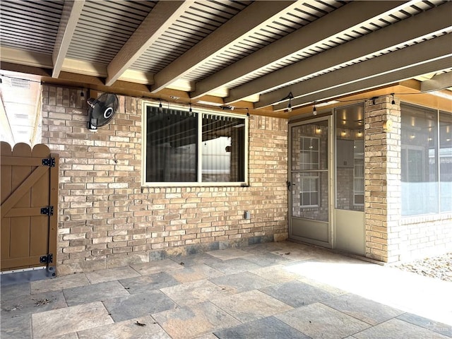 view of patio / terrace with a gate