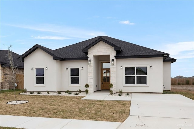 view of front facade with a front lawn