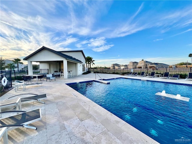 view of pool featuring a patio area