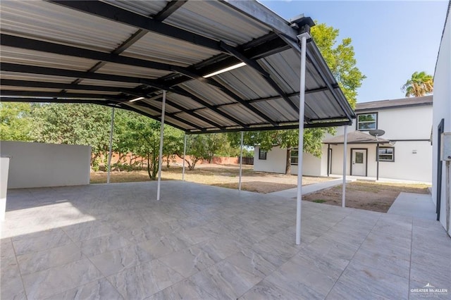 view of parking featuring a carport