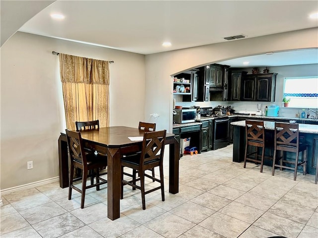 dining room with light tile patterned floors