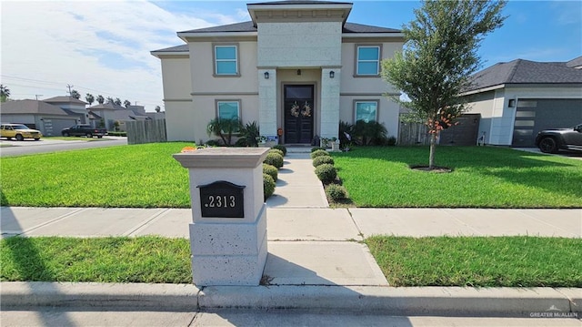 view of front of property featuring a front yard