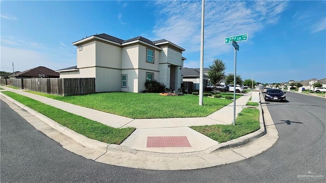 view of home's exterior with a yard