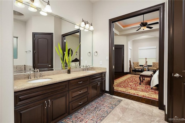 1807 Pecos St, Mission, TX 78572 - bathroom featuring connected bathroom, double vanity, and a ceiling fan