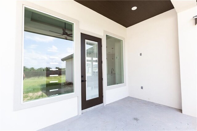 exterior space featuring french doors and ceiling fan