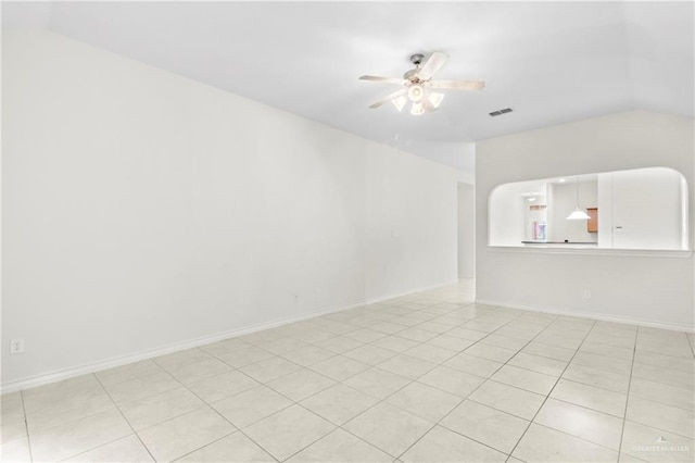 empty room with vaulted ceiling and ceiling fan