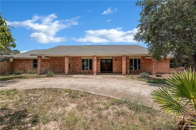 single story home with brick siding