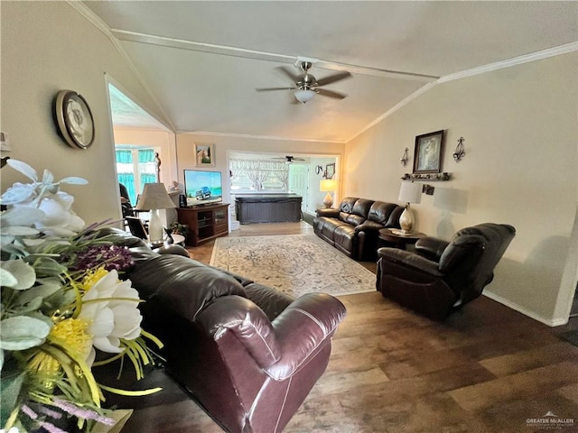 living room with crown molding, hardwood / wood-style floors, ceiling fan, and vaulted ceiling