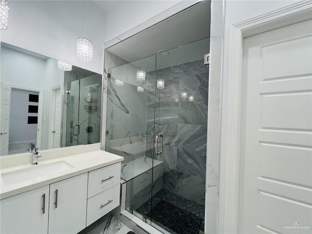 bathroom with vanity and walk in shower