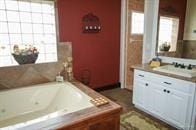 11213 N Fm 88th Blvd, Weslaco, TX 78599 - full bathroom featuring vanity and a bath