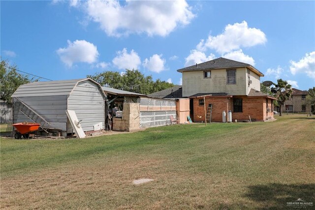 7027 Jo Din St, Edinburg, TX 78542 - back of property featuring an outbuilding