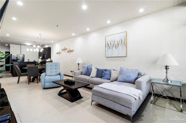 813 Travis St Unit 214, Mission, TX 78572 - living area featuring a chandelier, recessed lighting, light tile patterned floors, and baseboards