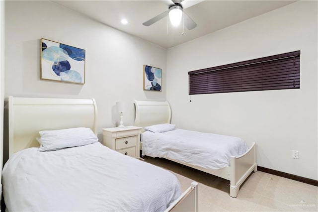 813 Travis St Unit 214, Mission, TX 78572 - bedroom featuring baseboards, a ceiling fan, and recessed lighting