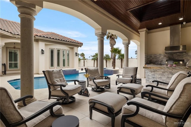 view of patio / terrace with an outdoor kitchen