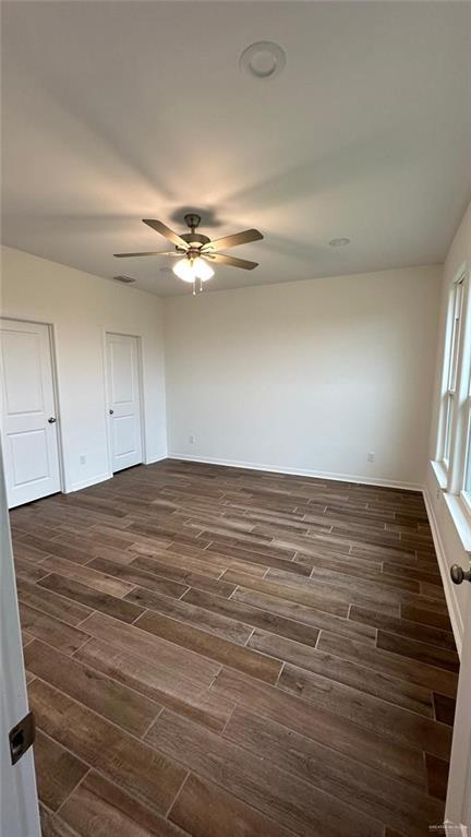 unfurnished room featuring ceiling fan