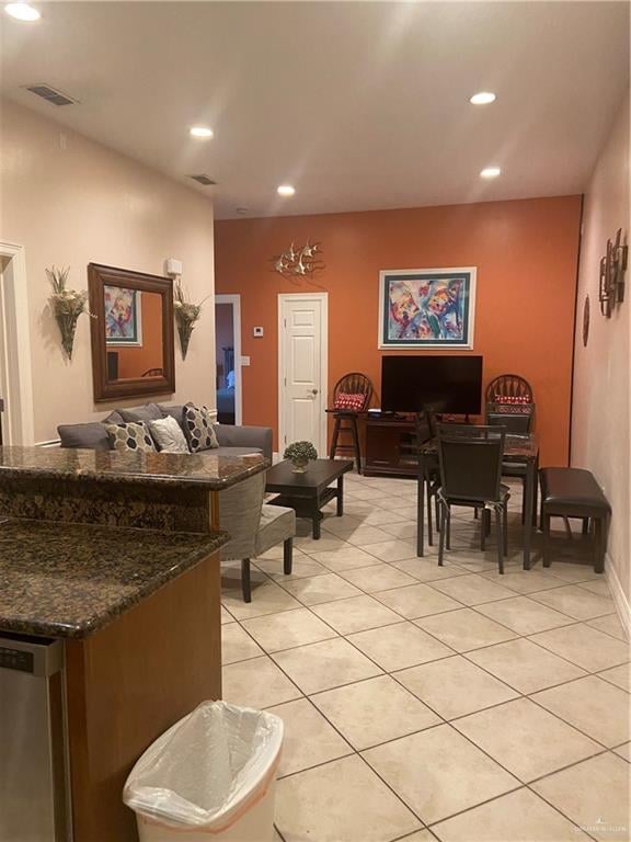 living room featuring light tile patterned flooring