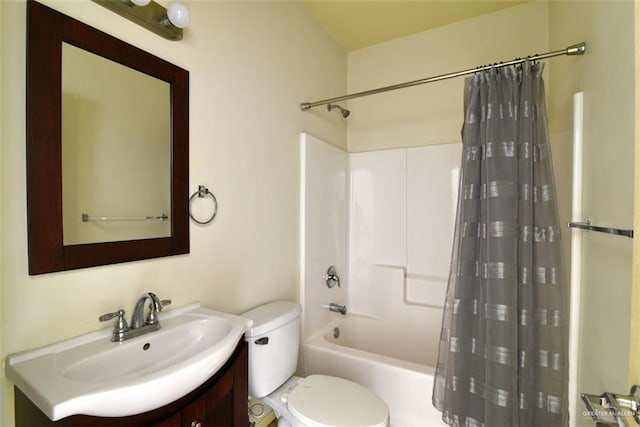 full bathroom with shower / bath combo, toilet, and vanity