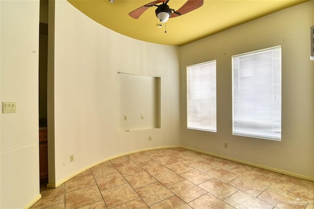 unfurnished room featuring ceiling fan