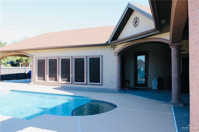 view of swimming pool featuring a patio