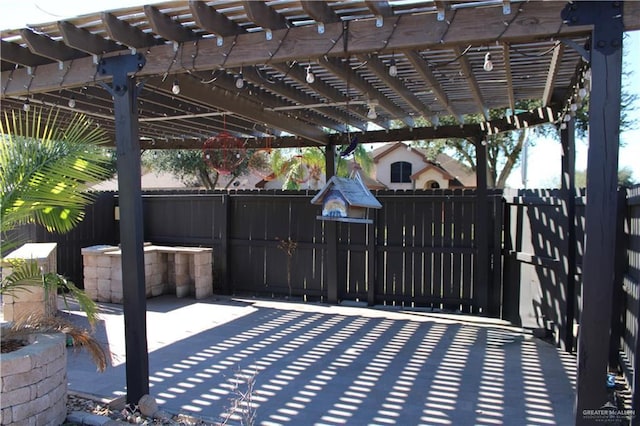 view of patio / terrace featuring a pergola