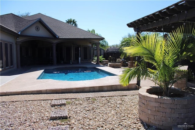 view of pool featuring a patio and a pergola