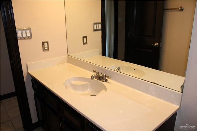 bathroom featuring vanity and tile patterned floors